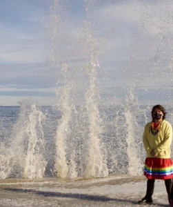 NaWalka Geeshy Meegwun - Longfeather pictured standing by a wave of water